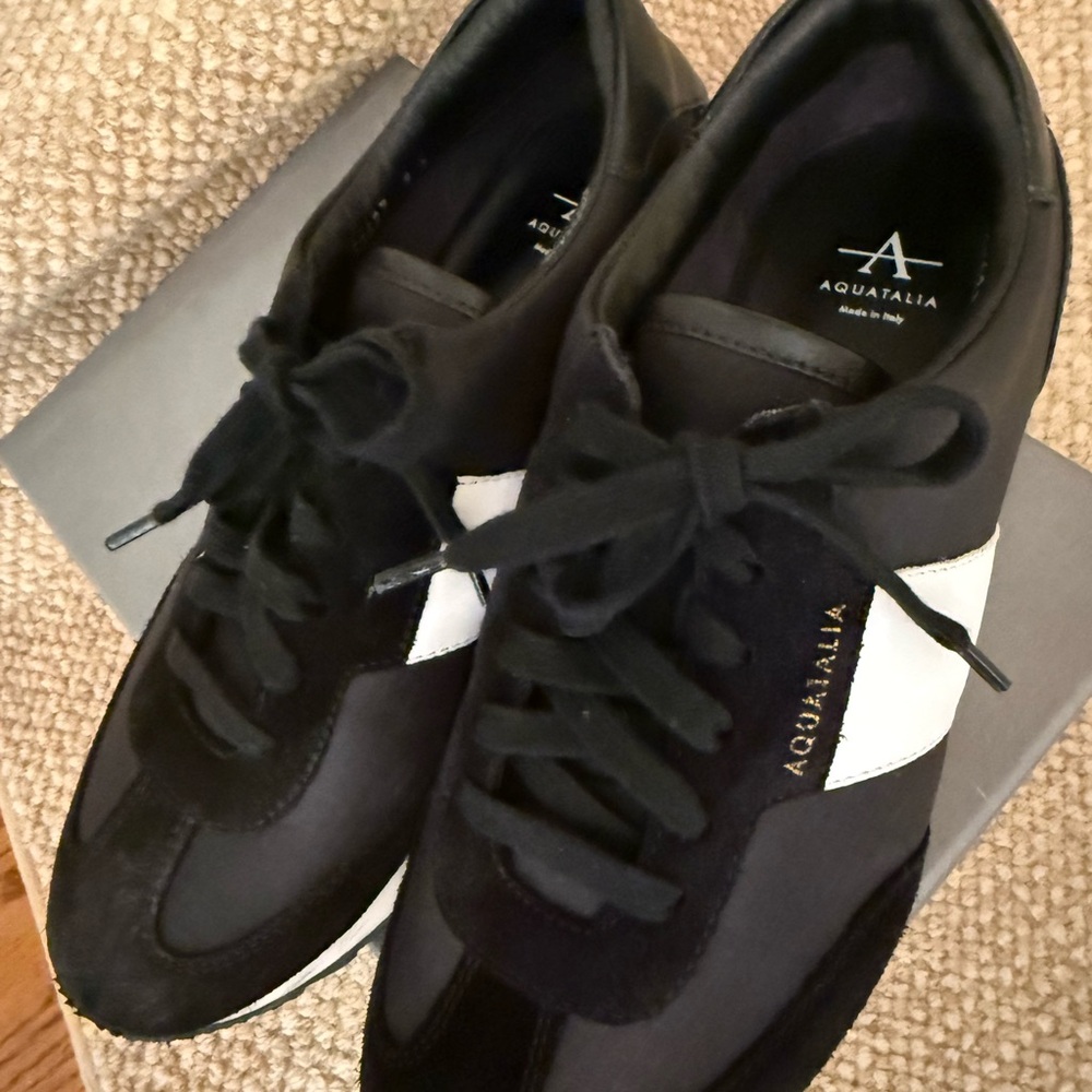 Aquatalia Women’s Black and White Sneakers
Size 9 
Waterproof